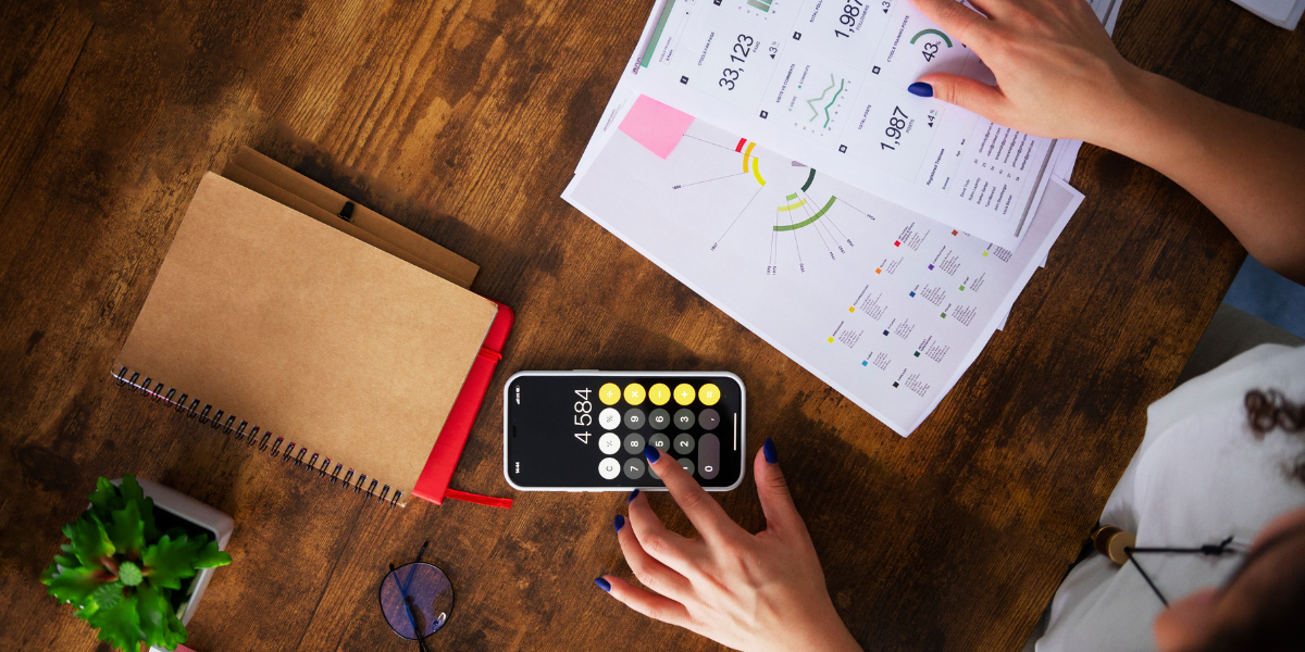 Student preparing for CA Final May 2026 with books, notes, and laptop on study desk.